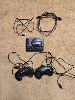 Sega mini console with controllers.
