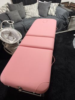 Pink massage table