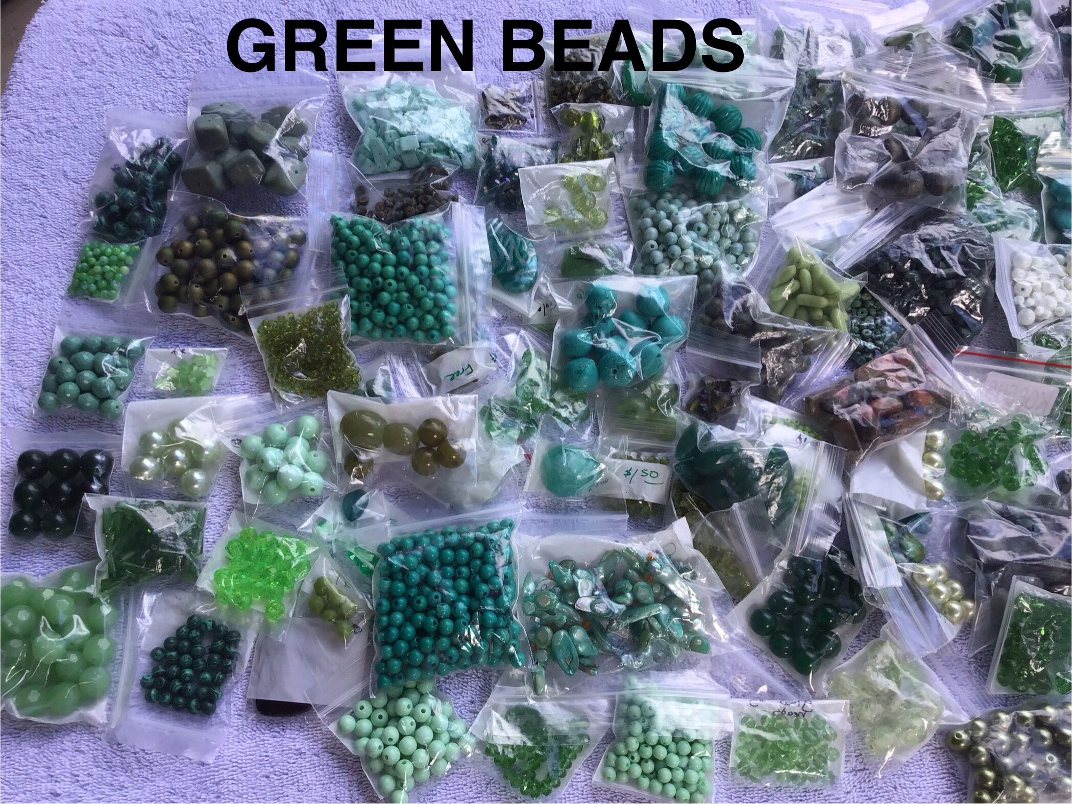 lots of green beads, prices vary, cleaned in ultrasonic cleaner with blue dawn