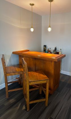 Solid wood bar with chairs