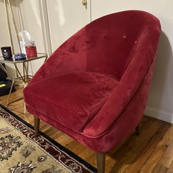 Two red/cranberry chairs with gold-toned legs