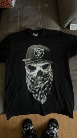 Size large black and silver raiders skull