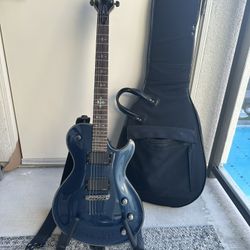 Used Schecter Guitar Research Damien Elite 6 Floyd Rose Metallic Blue Solid Body Electric Guitar