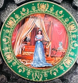 This vintage porcelain collectors plate from the "Josephine et Napoleon" series by Henri d'Arceau & Fils Limoges features a vibrant green border with 