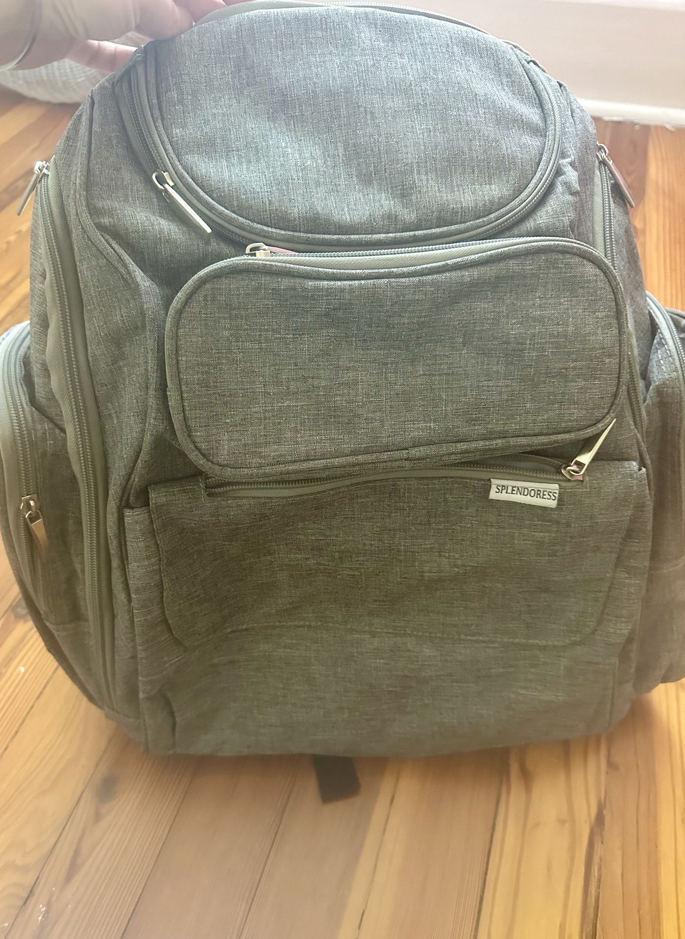 Diaper Bag With Rip On One Of Inner Pockets 