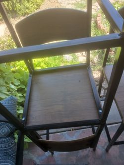 FOUR BROWN BAR STOOLS