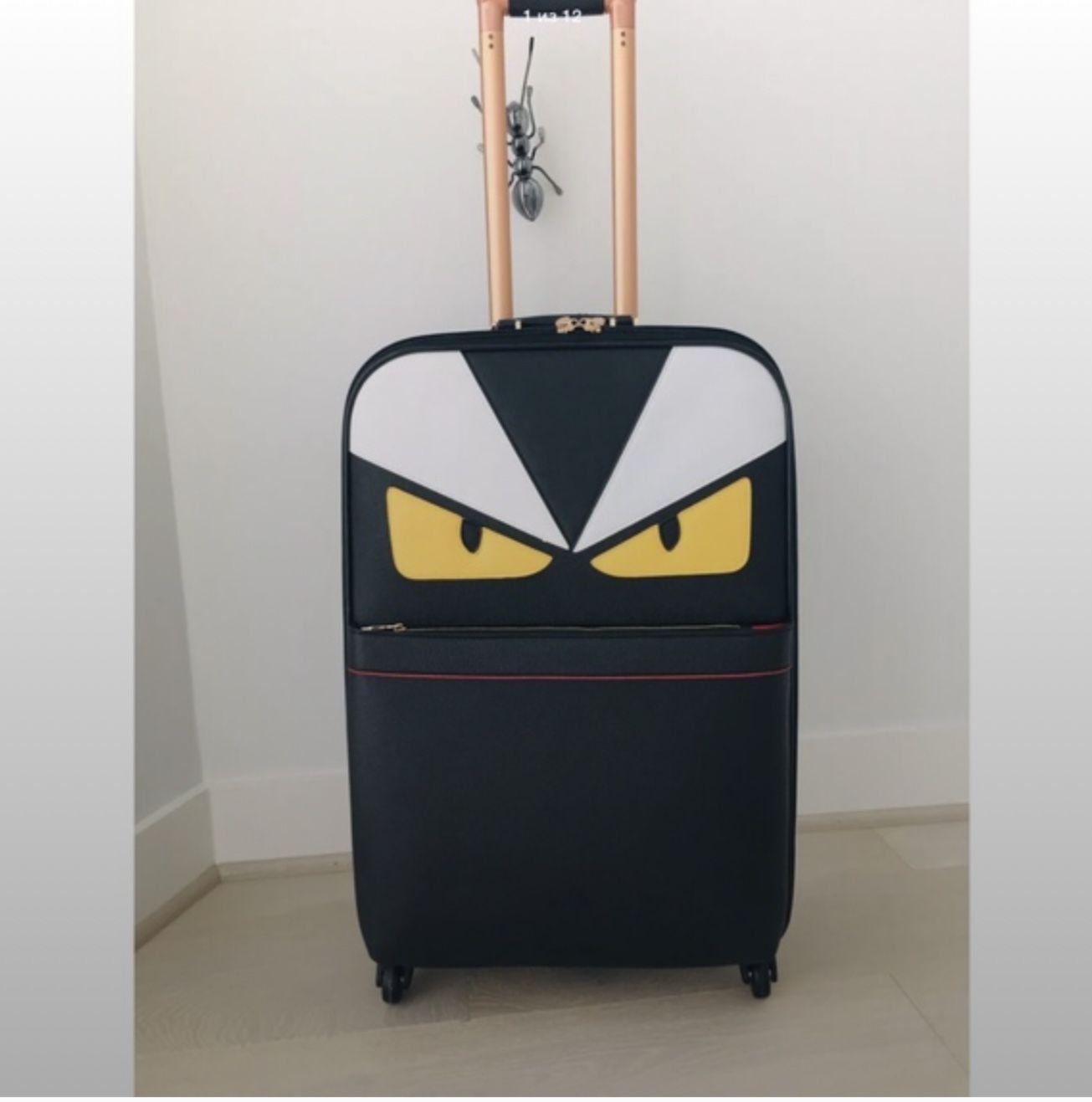 Eyes Monster Black Canvas Travel Rolling Suitcase Luggage 24 In. 