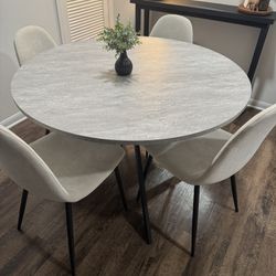 Round Dining Table And Chairs
