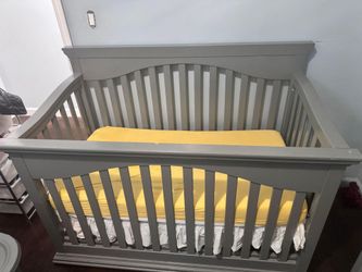 Gray Crib with crib