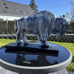 The old gray buffalo statue