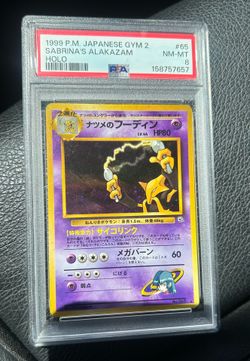 PSA 8 Japanese Sabrina’s Alakazam holo Pokemon card