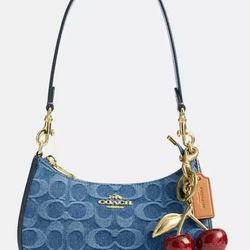 BRAND NEW coach purse with cherry charm