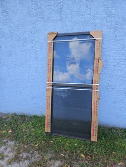 Lawson Bronze Impact Windows, Single Hung 37x 74. 