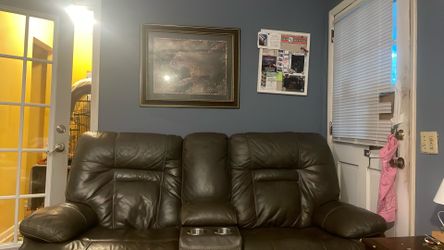 Reclinable gray couch With Cup holders 