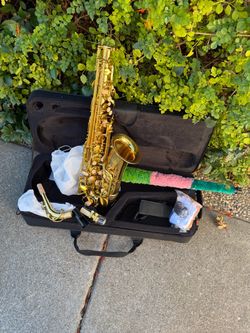 Alto Saxophone with Case and Accessories