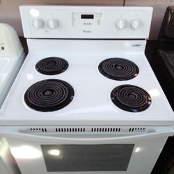 ELECTRIC STOVE WHIRLPOOL WHITE ON WHITE WORKING EXCELLENT EXCELLENT CONDITION WITH WARRANTY 