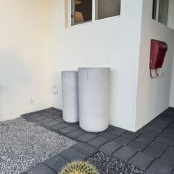 Tall concrete planters pots
