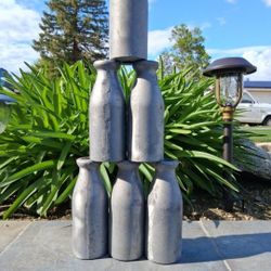 Vintage Original Aluminum Carnival Knock Down Knockdown Game Milk Bottle Toss ..(6) Bottles ....asking $150.00