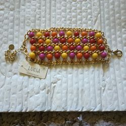 Multiple Colored Five String Beaded Bracelet.