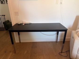 Black adjustable height table