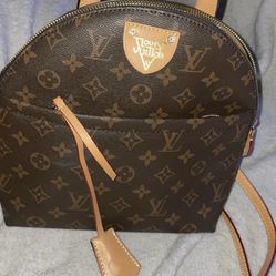 WOMEN’S Louis Vuitton Monogram Coated Mini Backpack 