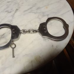 Vintage H.W.C Stainless Steel Hand Cuffs.