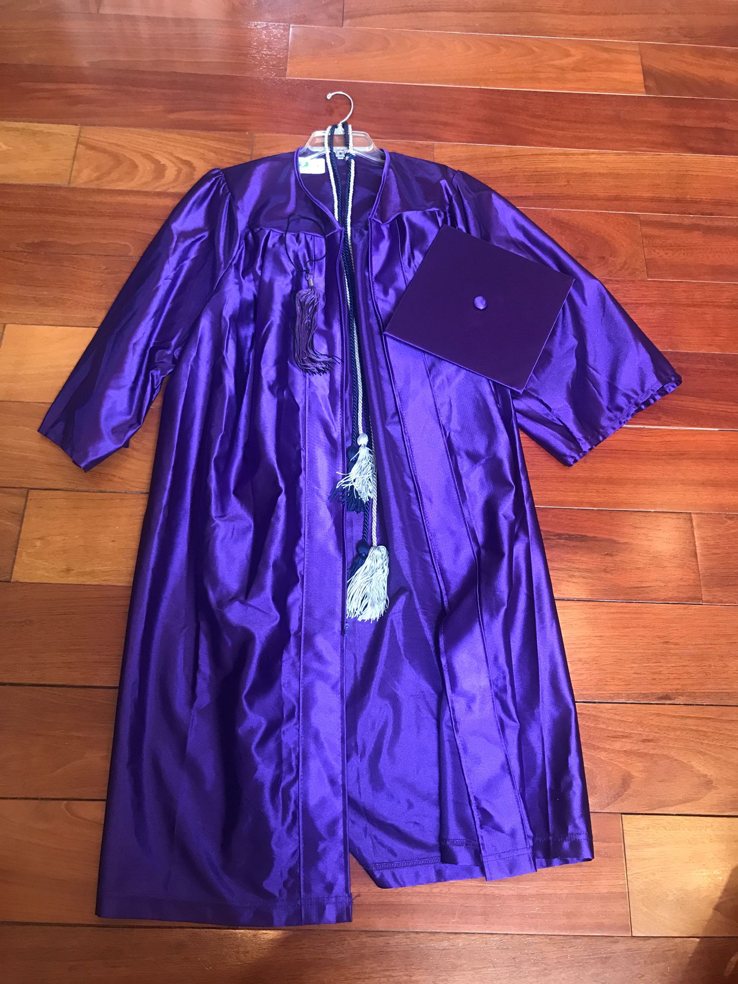 Purple Graduation Cap, Gown, Tassel, and Cords
