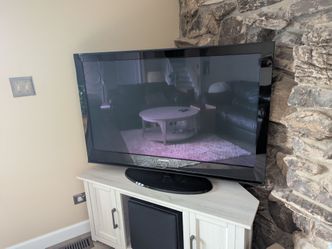 Samsung 50" plasma flat screen TV with  stand and remote