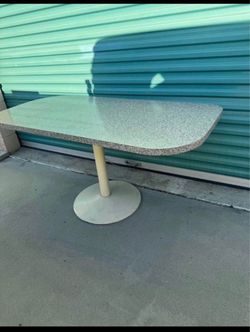Vintage pedestal dining table