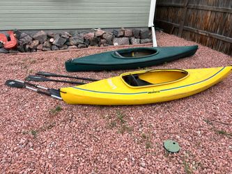 Kayaks with paddlers--recreational