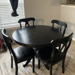 Black wooden dining room table