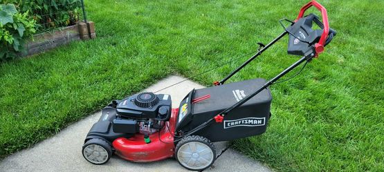 Craftsman m215 self propelled lawn mower deals