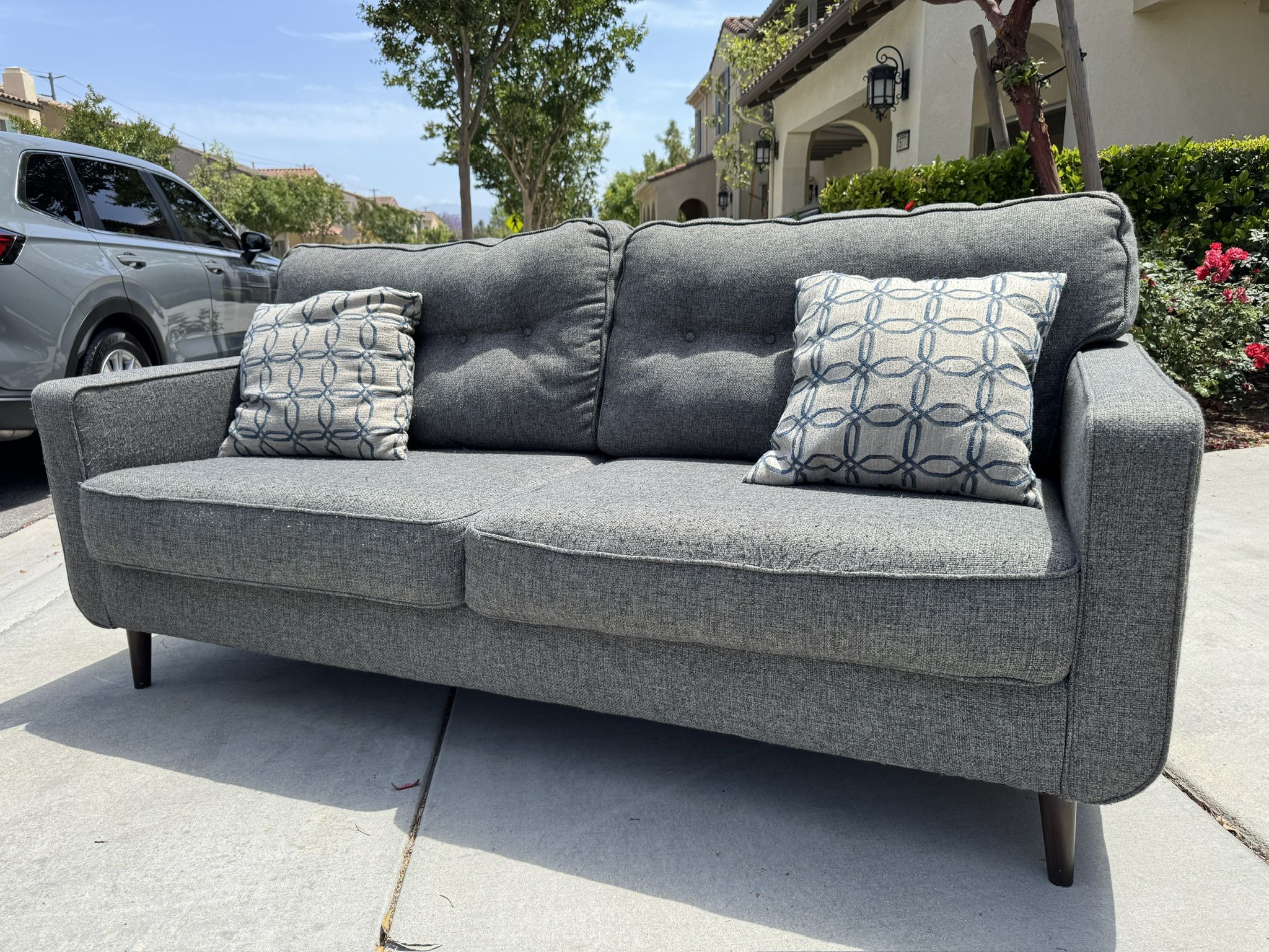 Grey Couch with 2 Pillows