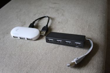 (2) USB one to four expansion (1) is a Targus & (1) is a Logistic