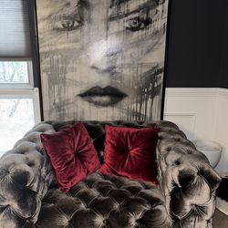 Stuffed Grey Couch & painting
