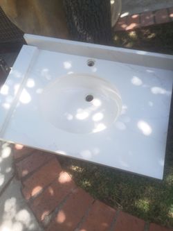 Kohler vanity top 22x32   very good condition with backsplash