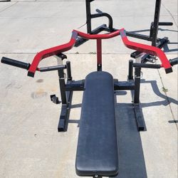 Very nice weight bench and squat rack.