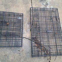 Two dog cages