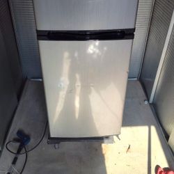 small refrigerator almost 6 feet long