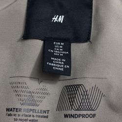 Greenish H&M windbreaker jacket