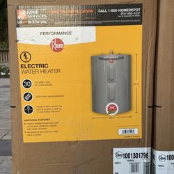 New in box Rheem performance 30 gallon electric water heater