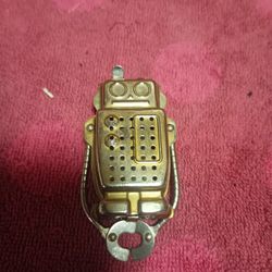 A Robot Shaped Tea Infuser For Sale.
