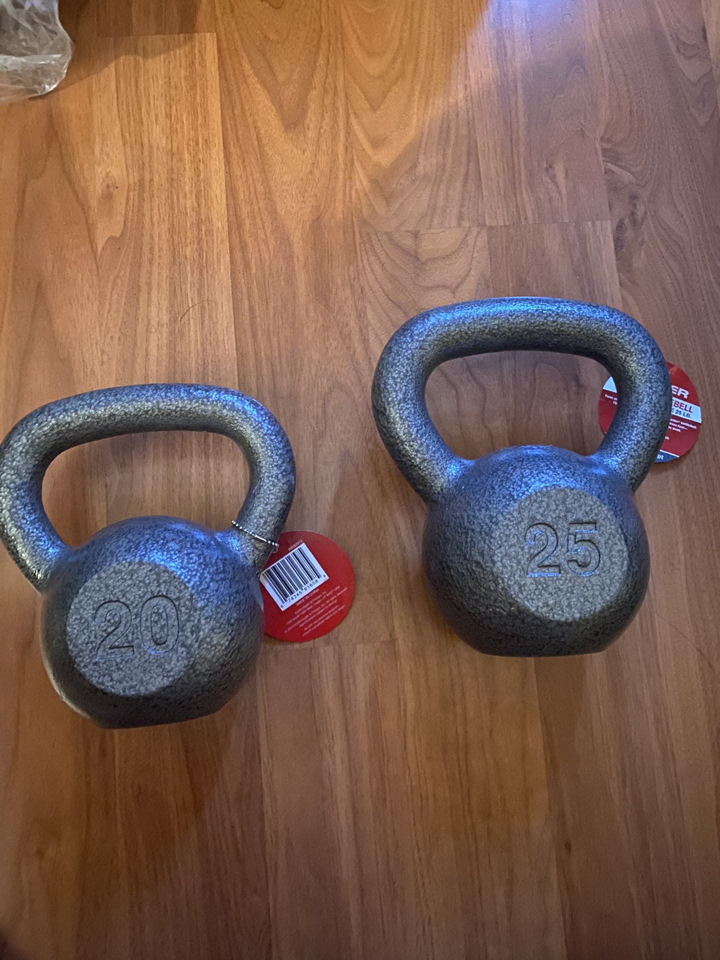 Kettlebells- iron cast 20 pounds and 25 pounds