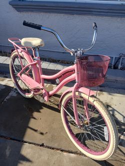 Women's 24" pink Huffy Beach Cruiser