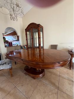 Dining table, china hutch and entertainment unit. Same future style for all pieces. Pure wood, classical look.