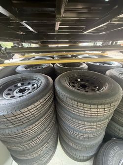 Brand new 205/75R15 Tire on 5-Lug Rim