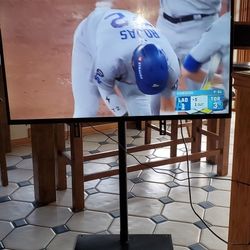  Ultra HD LED TV On A Stand