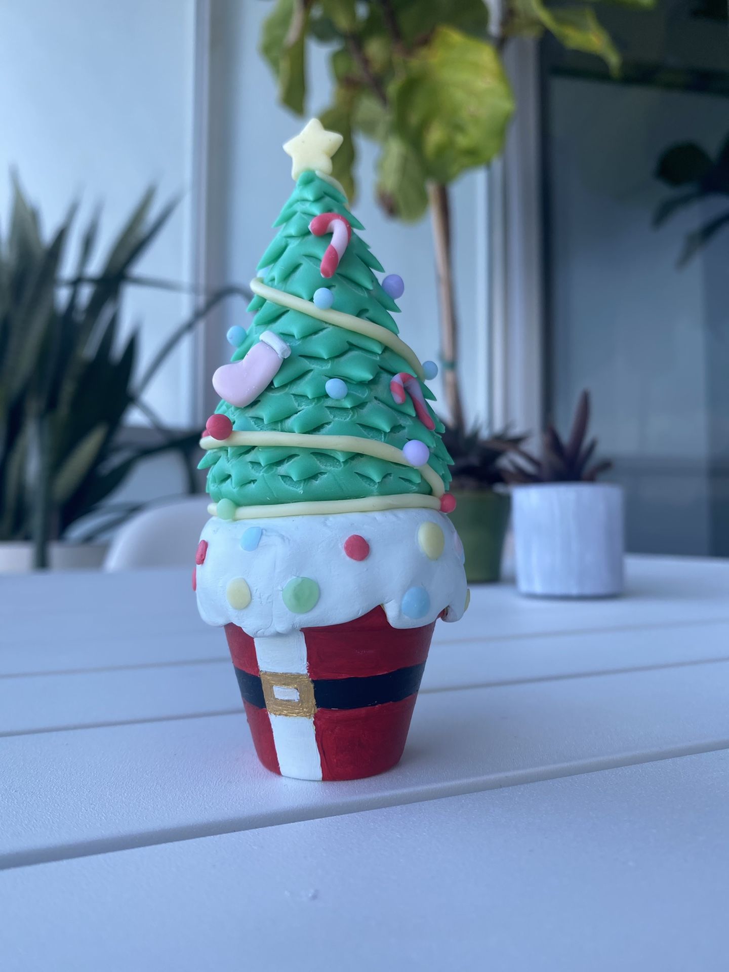 Handmade mini Christmas tree in a pot. Cold porcelain