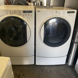 Frontload Kenmore washer and electric dryer on mini pedestals can deliver
