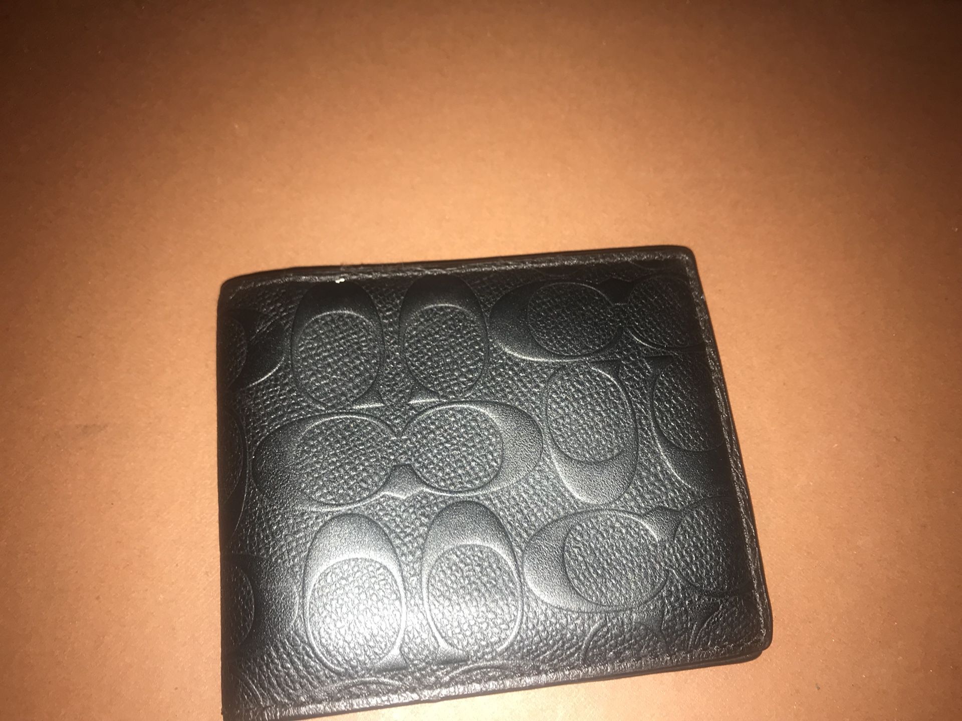 Like new Coach men’s leather wallet